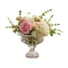 A transparent carved glass vase with a bouquet as a decorative item for the living room dining table Item Picture